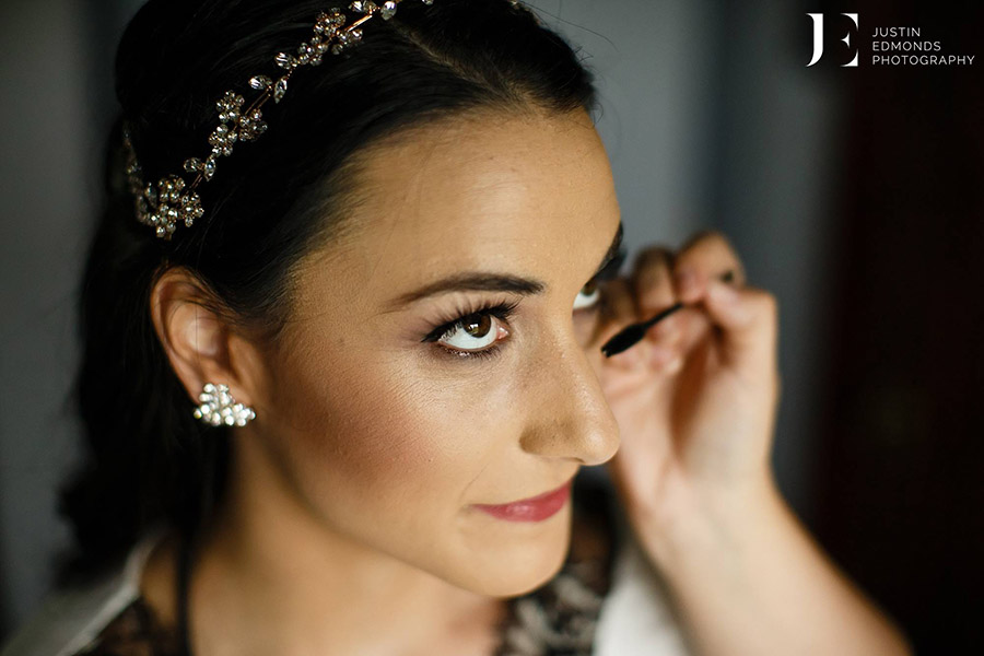 Makeup artist from Beauty on Location Studio applying makeup on Colorado bride