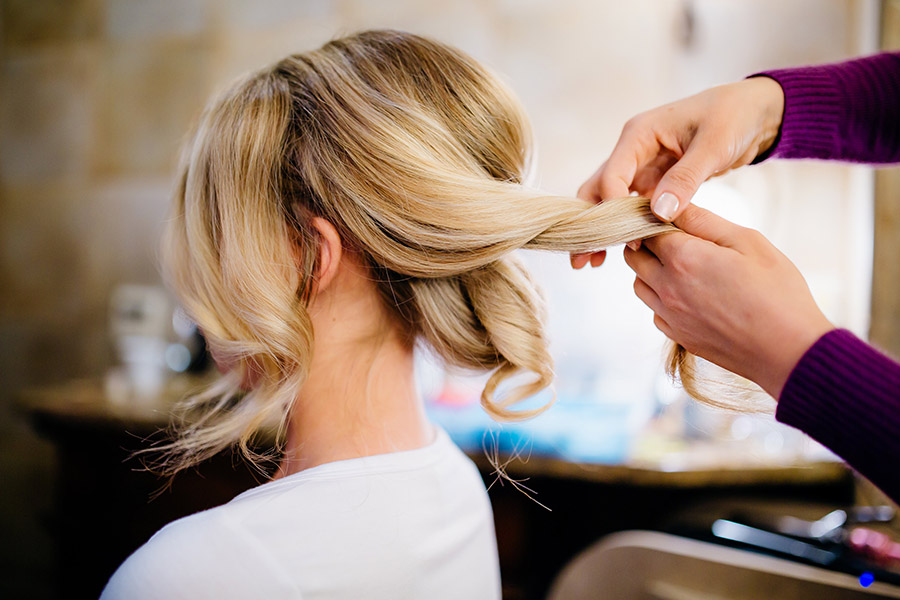 Colorado bride with braided updo bridal hairstyle by Beauty on Location Studio of Denver