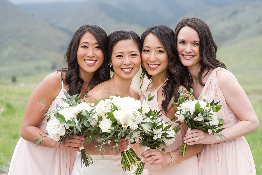 Colorado bride and bridesmaids with makeup and bridal hairstyle by Beauty on Location Studio of Denver